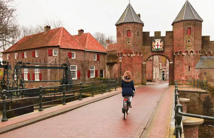 Old city defense wall of dutch city Amersfoort. In winter with cloudy sky.; Shutterstock ID 96325208